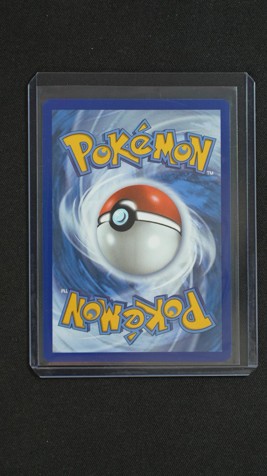 Team Rocket's Larvitar 094/182 Common Destined Rivals Pokemon Reverse Holo NM